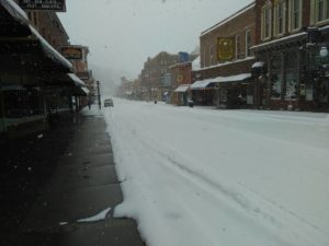 Deadwood Street covered in snow where casinos are located 