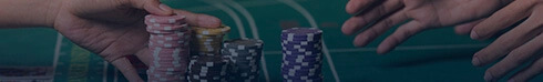 Moving Stacks of Chips on a Baccarat Table Banner